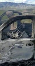 The burnt wreckage of a vehicle in northern Mexico that had been carrying members of the LeBarón family when they were attacked on Monday.