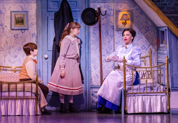 Stefanie Jones as Mary Poppins, with the two children.