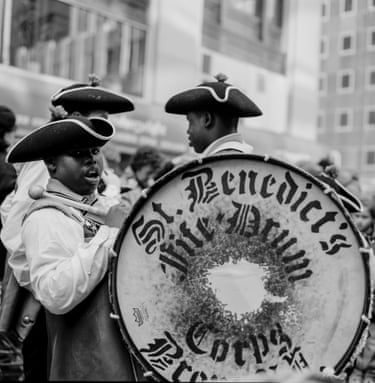 a man holding a drum