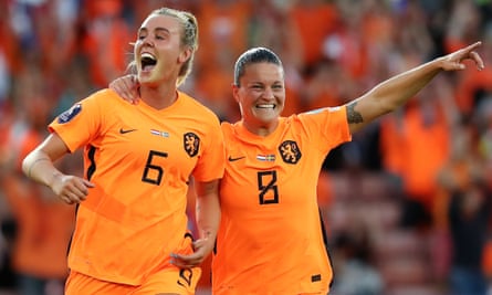 Jill Roord and Sherida Spitse celebrate a goal against Sweden during Euro 2022 at Bramall Lane