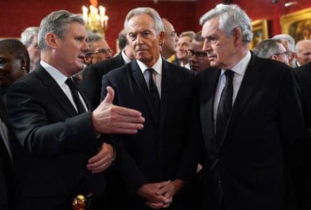 From left, Britain’s Labour leader Sir Keir Starmer, Britain’s former Prime Ministers Tony Blair and Gordon Brown speak together ahead of a meeting of the Accession Council inside St James’s Palace in London on September 10 2022, to proclaim King Charles III as the new King