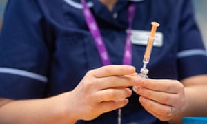 Nurse with syringe