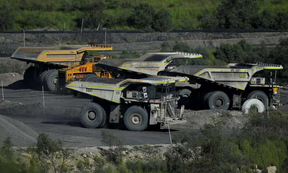 A coal truck passes others inside Rio Tinto’s Hunter Valley operations in New South Wales.