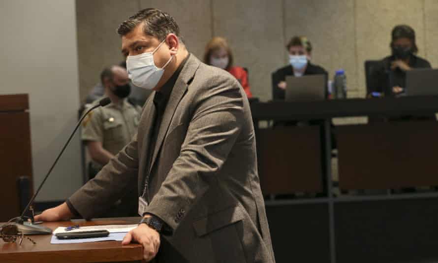 The St Louis county health director, Dr Faisal Khan, answers questions posed by council members said he was called racial slurs and physically assaulted at a meeting in July after defending a mask mandate.