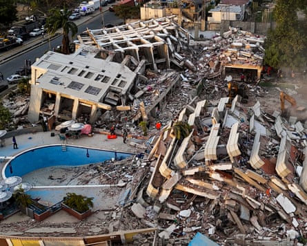 This aerial view shows buildings destroyed following twin earthquakes in Caraballeda, La Guaira State, Venezuela, on 29 June 2026. Hopes were fading of finding survivors more than four days after powerful twin earthquakes struck Venezuela, as residents grow increasingly frustrated with the government’s response to the disaster that has killed -up to now- more than 1,700 people and left tens of thousands unaccounted for.