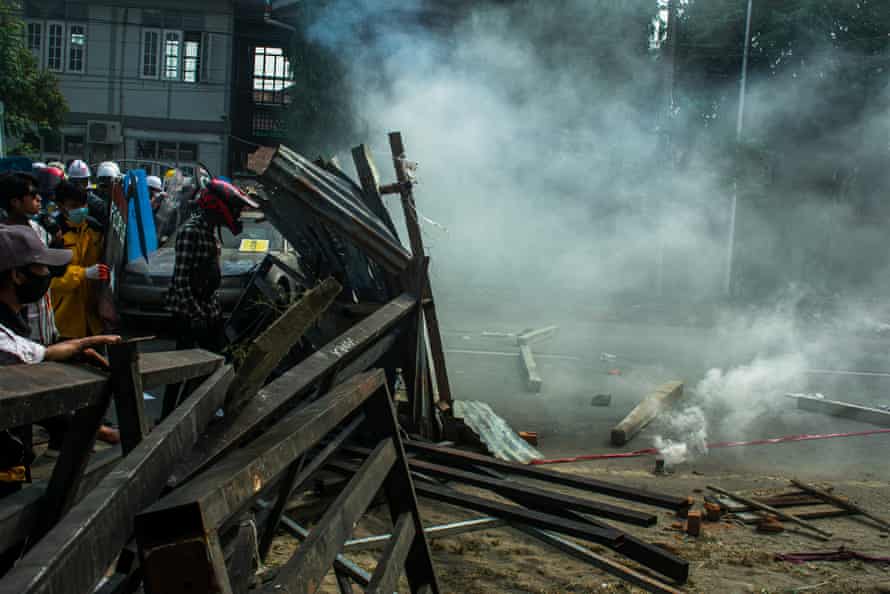 Protesters clash with police in Myitkyina.