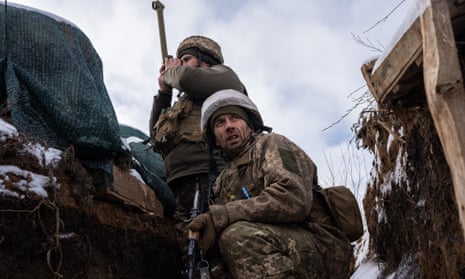 Ukrainian soldiers patrol on the frontline in Zolote as fears of a Russian attack increase.