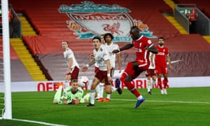 Sadio Mane scores Liverpool’s equaliser from close range.