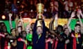 Xabi Alonso lifts the DFB Pokal trophy after Bayer Leverkusen beat Kaiserslautern on 25 May 2024.