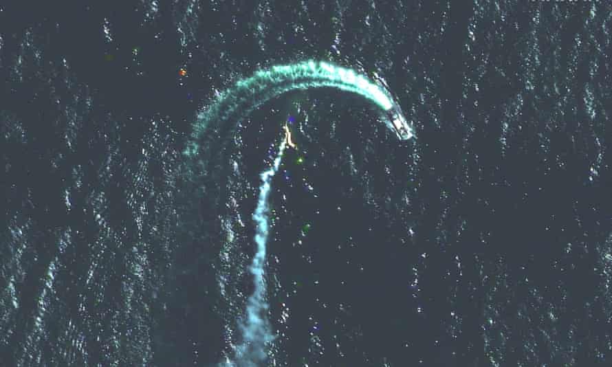 A satellite image shows a Russian Serna-class landing craft and possible missile contrail near Snake Island, Ukraine.
