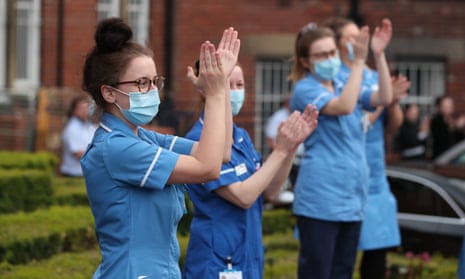 Hospital workers clap outside Leeds General Infirmary
