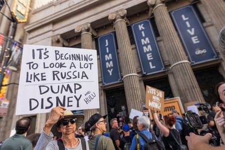 people protesting outside a building