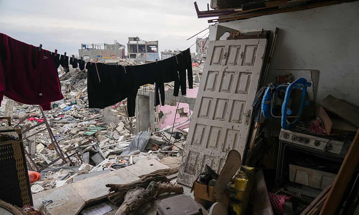 Clothes hang to dry outside a destroyed room belonging to the Nassar family in the Jabaliya refugee camp in the northern Gaza Strip.