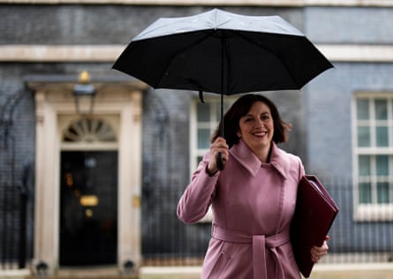Bridget Phillipson holding an umbrella as she leaves Downing Street