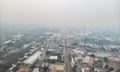 Aerial shot of San Pedro Sula, Honduras, covered in a thick blanket of smog.
