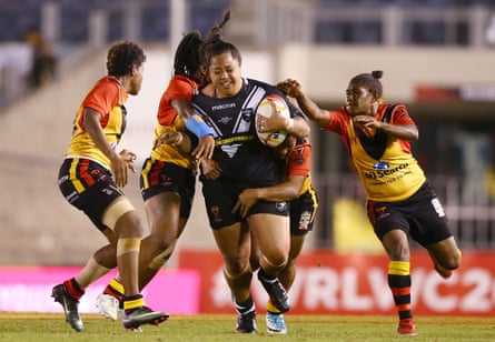 Annetta Nuuausala of the Kiwi Ferns takes on the Papua New Guinea Orchids in Rugby League World Cup.