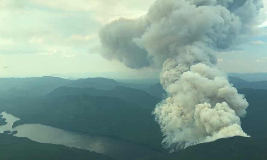A plume of smoke is seen near McKinley Lake and about 35km east of Horsefly, British Columbia, on 30 June.