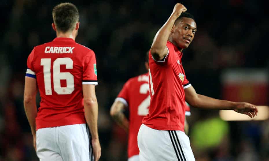 Anthony Martial of Manchester United celebrates scoring his goal to make it 4-0 against Burton Albion at Old Trafford on Wednesday night.