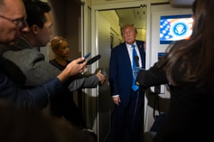 Donald Trump facing people with mics