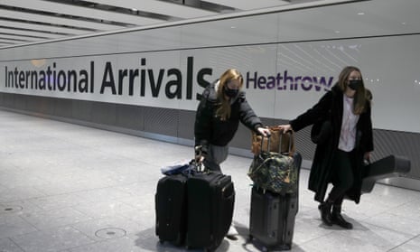 Passengers arrive at Heathrow airport on 17 January 2021.