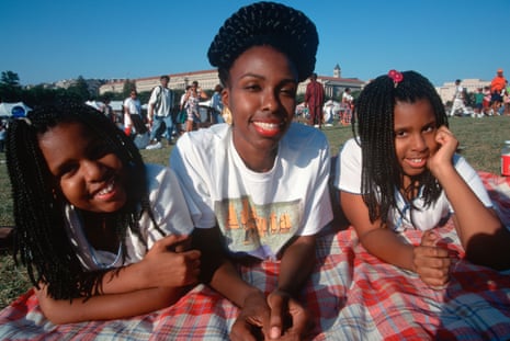 Group portrait on a lawn of a Black family