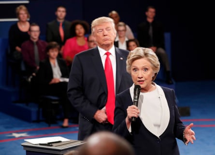 a woman speaks into a microphone
