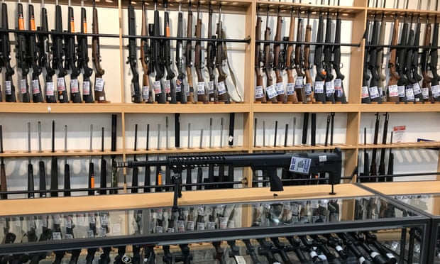 FILE PHOTO: Firearms and accessories are displayed at Gun City gunshop in Christchurch, New Zealand, March 19, 2019. REUTERS/Jorge Silva/Files