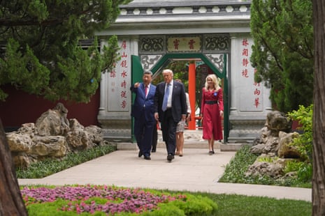 Donald Trump and Xi Jinping tour the Zhongnanhai leadership compound.