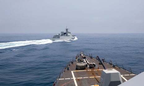 The USS Chung-Hoon observes a Chinese navy ship conduct what it called an ‘unsafe’ manoeuvre in cutting sharply across its path in the Taiwan Strait on Saturday