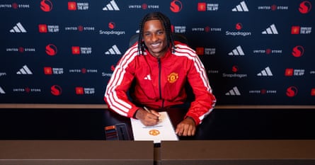 Tynan Thompson with his Manchester United contract