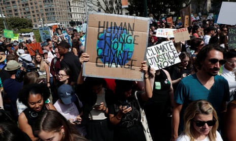 Activists take part in a demonstration as part of the Global Climate Strike in Manhattan in New York, U.S., September 20, 2019. REUTERS/Shannon Stapleton
