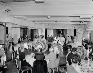 Visitors seated at tables in the club Sammy Lee’s on Oxford Street, Paddington, in 1953