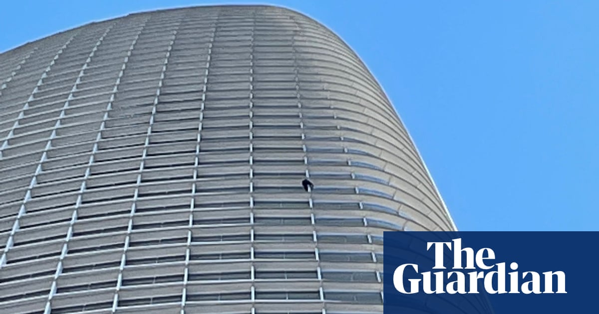 ‘Pro-life Spiderman’: anti-abortion activist climbs San Francisco’s tallest building