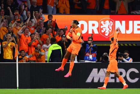 Virgil van Dijk has the ball in the back of the Germany net.