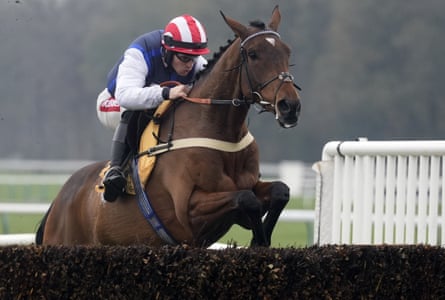 The Jukebox Man jumps a fence.