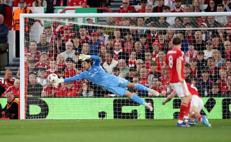 Nottingham Forest's keeper Stefan Ortega makes a save from Aston Villa's Morgan Rogers.