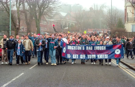Fans protest against the clubâÂÂs owners as they march to the Goldstone ground on a Fans United day before the match against Hartlepool in 1997