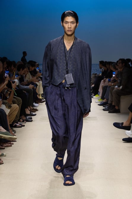Navy blue viscose jacket, trousers and waistcoat with suede leather sandals by Giorgio Armani.