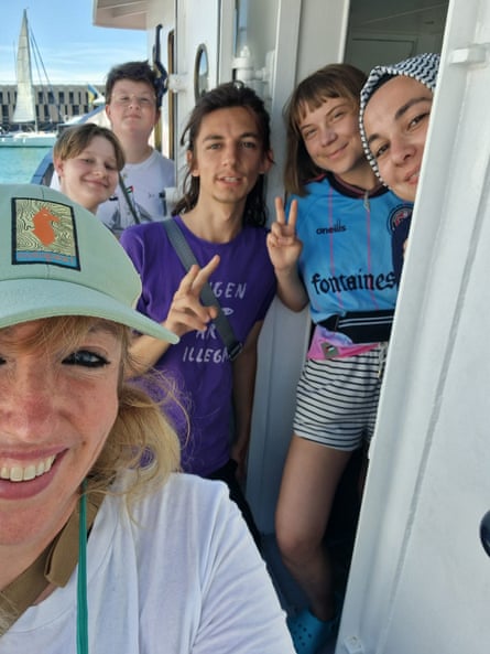 The Irish activist Caoimhe Butterly takes a selfie with Gaza flotilla members in June, including Greta Thunberg, who is sporting the Bohs shirt