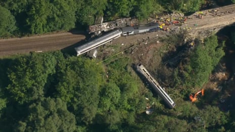 Stonehaven: aerial footage shows extent of damage after train derailment – video 