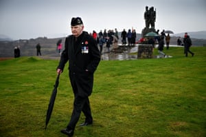 A small number of serving and former Royal Marine commandos gather at Commando Memorial to commemorate and pay respect to service personnel who fought in the two world wars and subsequent conflicts