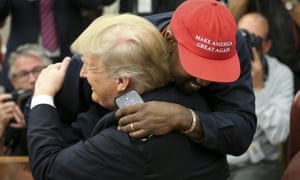 Donald Trump hugs Kanye West during a meeting in the Oval office on 11 October.
