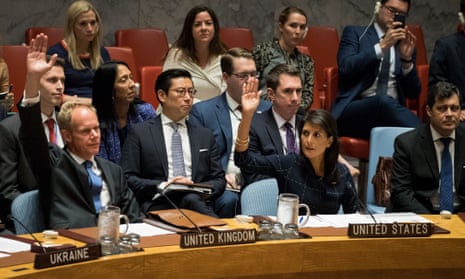 Matthew Rycroft, United Kingdom ambassador to the United Nations, and Nikki Haley, United States ambassador to the United Nations, raise their hands as they vote yes to levy new sanctions on North Korea.