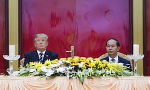 Vietnam's president, Tran Dai Quang, and Donald Trump attend a state dinner in Hanoi on Saturday.