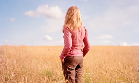 Woman alone in wheat field