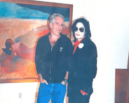 Epstein and Jackson stand in front of a painting