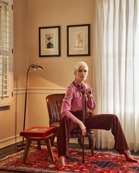 Selma Blair photographed sitting on a chair