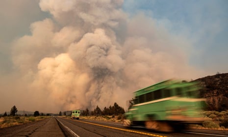 Firefighters in Weed, California rush to tackle a blaze. Research by Herrington affirmed the bleaker scenarios put forward in a landmark 1972 MIT study, The Limits to Growth.