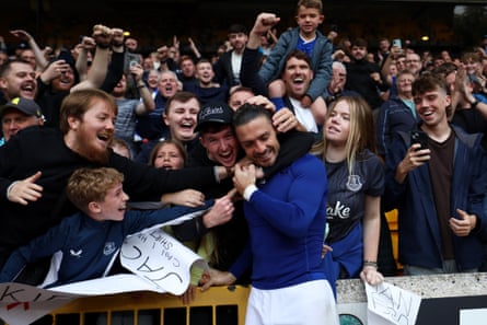 Jack Grealish celebrates with Everton fans.