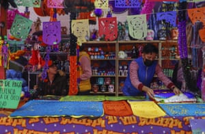 Merchants sell products to celebrate the Day of the Dead in Jamaica market, Mexico City